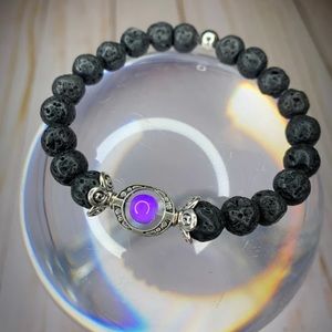 Soul in stone handmade lava stone bracelet with a single purple chalcedony